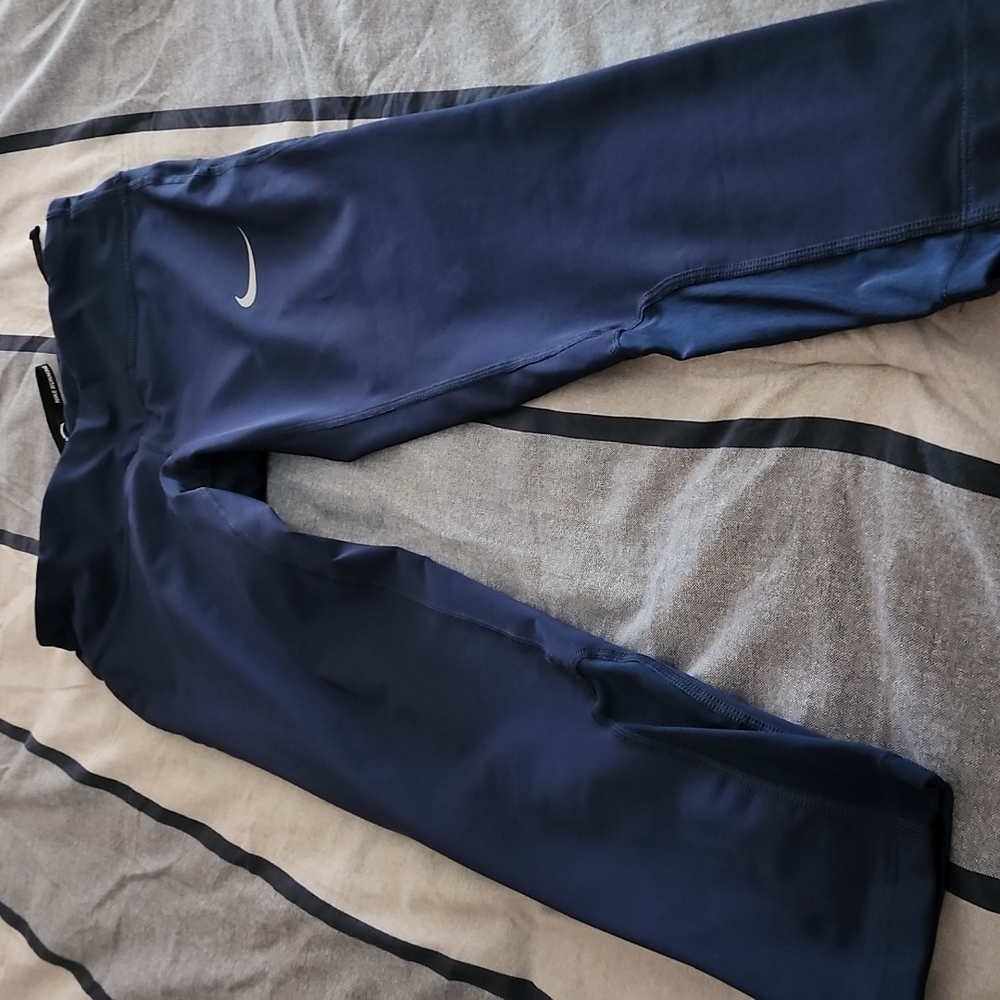 Nike dri fit blue leggings, size s.